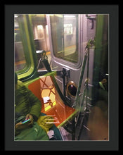Photo On The New York City Subway - Framed Print