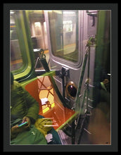 Photo On The New York City Subway - Framed Print