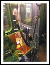 Photo On The New York City Subway - Framed Print