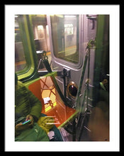 Photo On The New York City Subway - Framed Print