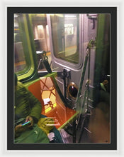 Photo On The New York City Subway - Framed Print